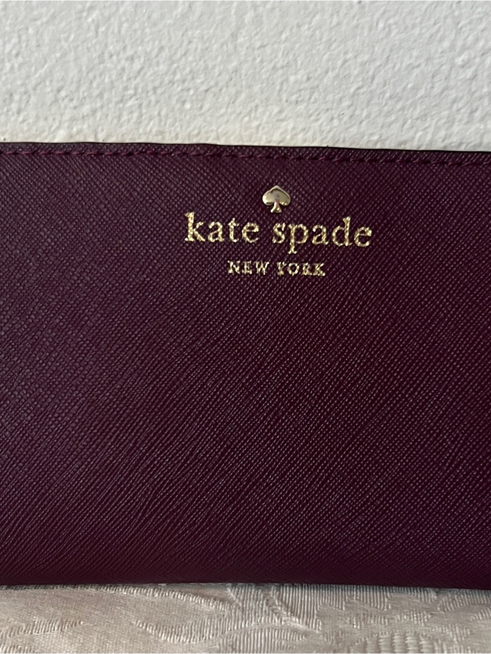 kate spade Plum Saffiano Leather Zip Wallet with Gold Logo